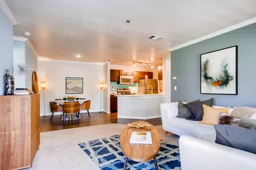 A Living Room and Kitchen at Eagles Landing at Church Ranch Apartments - Eagles Landing