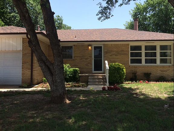 Side Exterior - garage and driveway