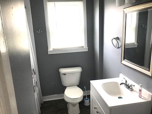 Renovated bath fitters new tub and new toilet and new flooring.