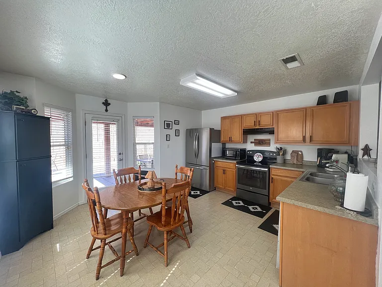 6148 Malpais Park Ave NW — Photo 7
