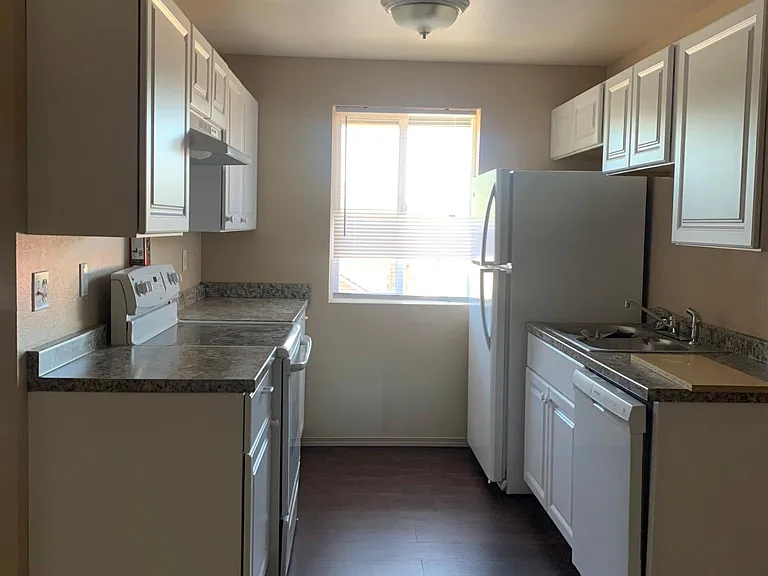 Finished new kitchen. New Cabinets, countertops, sink, dishwasher and flooring. With self cleaning oven/glass top stop.