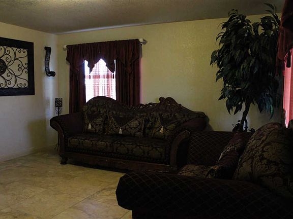 4th image of 8650 E 26th Pl