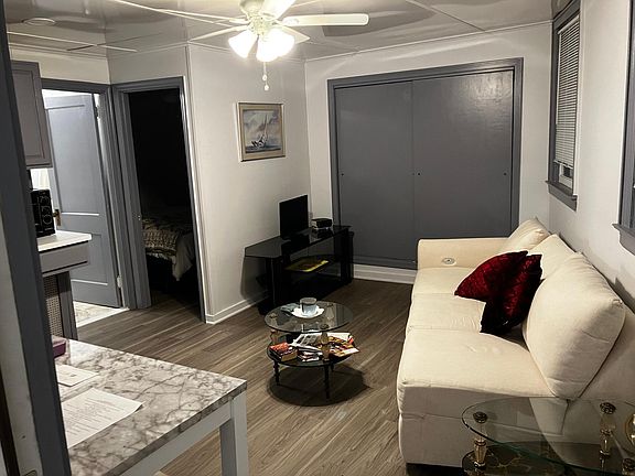Livivngroom/cooking area. All New. 10X10ft closet and 10Ft high. Ceiling fans in the living room and bathroom.