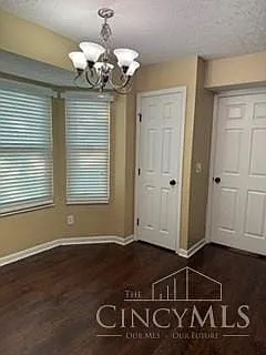 Kitchen showing the bay window and pantry.