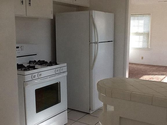 Refrigerator and gas stove