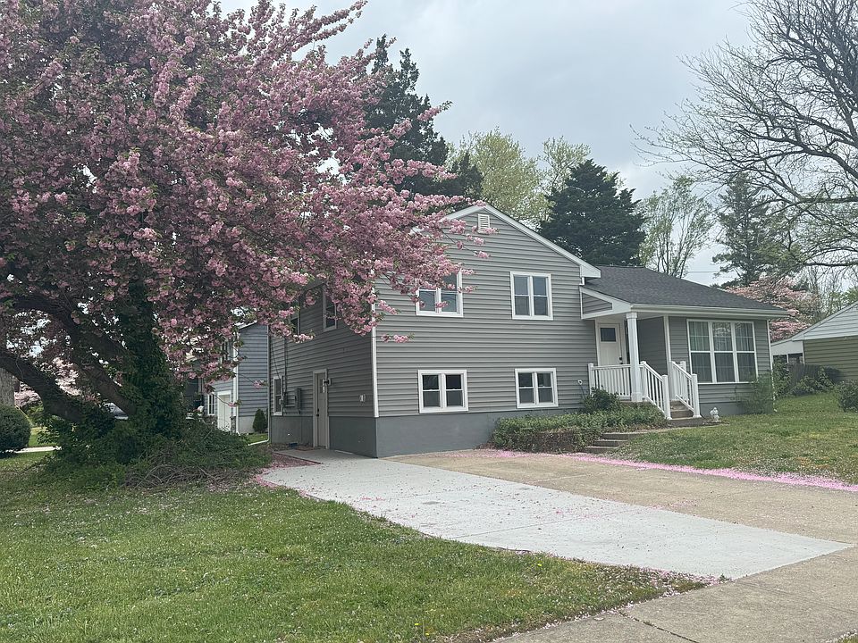 Beautiful corner lot with 2 car driveway and separate entrance for ground floor