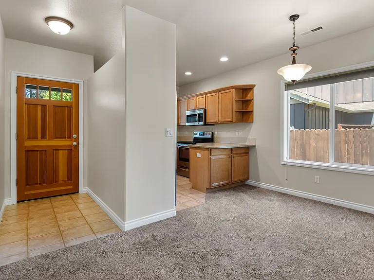 Tile Entryway, Dining Area & Kitchen.