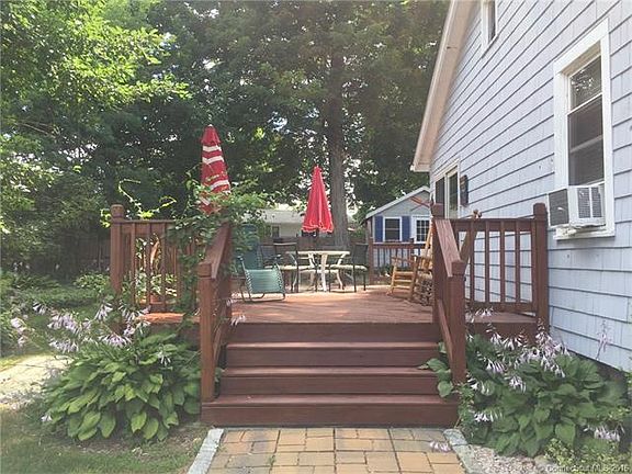 Deck, shed in backyard