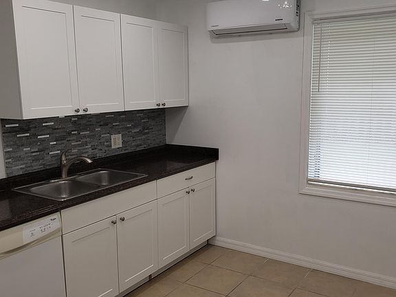 New cabinets, backsplash and up top you can see the 12000btu minisplit A/C