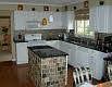 UPDATED KITCHEN WITH GRANITE/SLATE BACKSPLASH