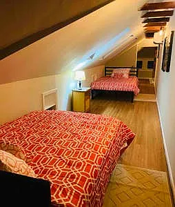 2 Full Beds, skylights & quaint sitting area. Upper level has it's own mini-split unit to control AC/heat