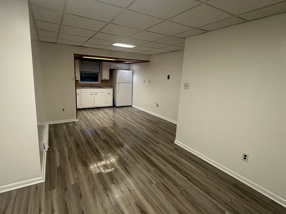 the living room and the kitchen