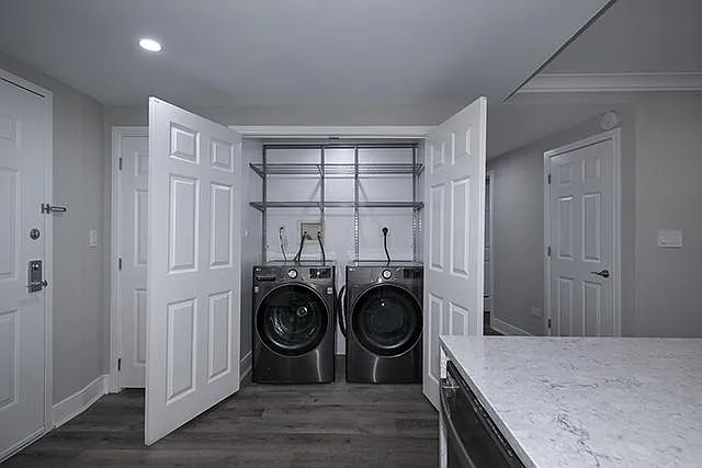 Stainless Front Load Washer and Dryer, Raised Panel Doors with Nickel Finish Levers.