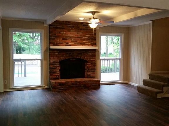 With the floor to ceiling windows flanking this beautiful gas st