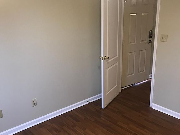 View as you are leaving the bedroom entering the living room.