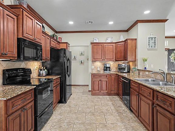 4th image of 12600 N Rockwell Ave Unit 33