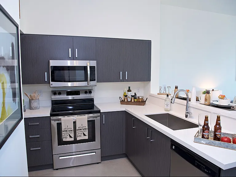 2 Bedroom Model Unit | Kitchen with Stainless Steel Appliances