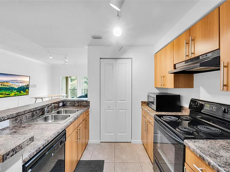 5880 W Sample Rd #203 — Photo 4