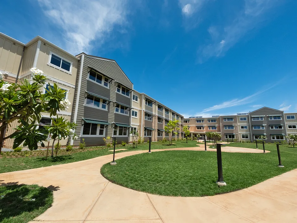 Brand-new apartment community with private balconies and landscaped courtyard.