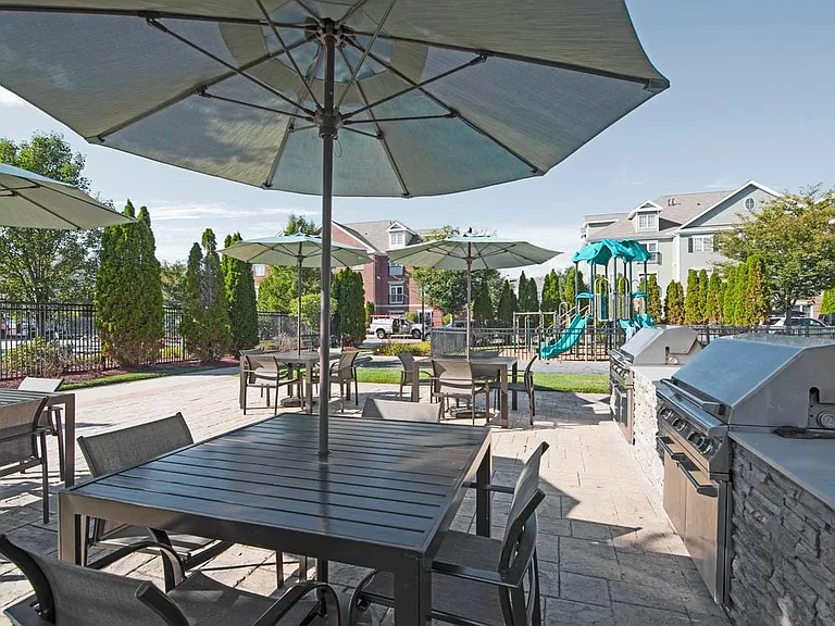 Courtyard with grills and dining areas