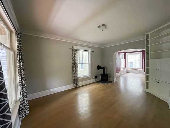 Living room has a stove for those chilly Seattle nights!