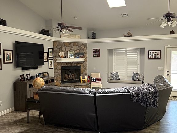 Bright, open living space with updated vinyl flooring throughout.