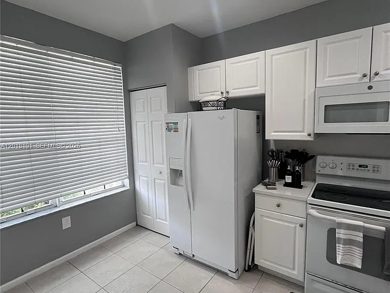 681 NW 42nd Ave #- — Photo 4
