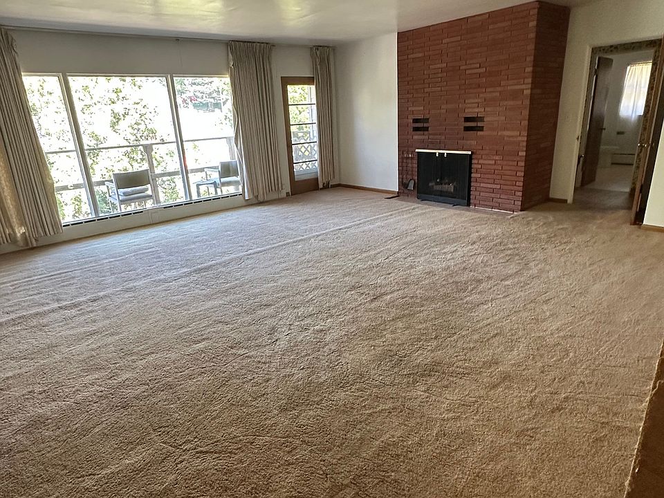 Open Living/Dining Area with Balcony