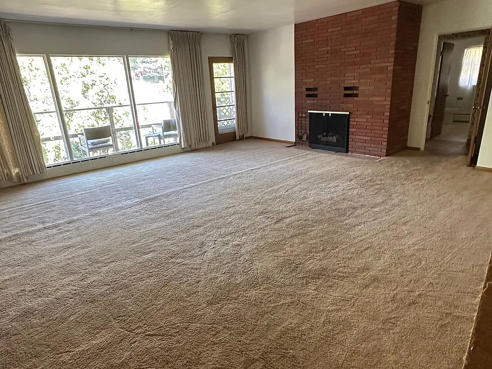 Open Living/Dining Area with Balcony