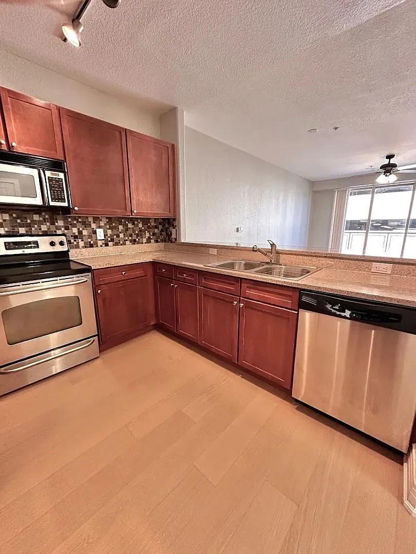 Open-Concept 2BR Condo | Private Primary Suite & Community Amenities — Photo 2