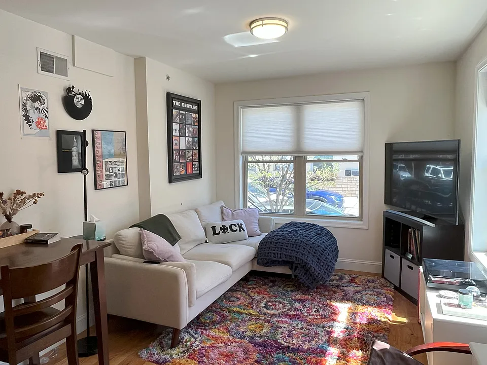 Furnished living room, looking East