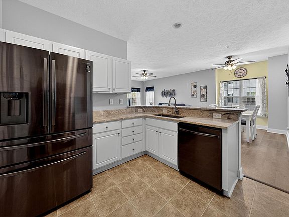 5th image of 6010 Windsor Green Way #204