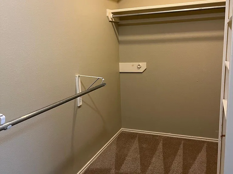 Large walk-in closet in master bedroom