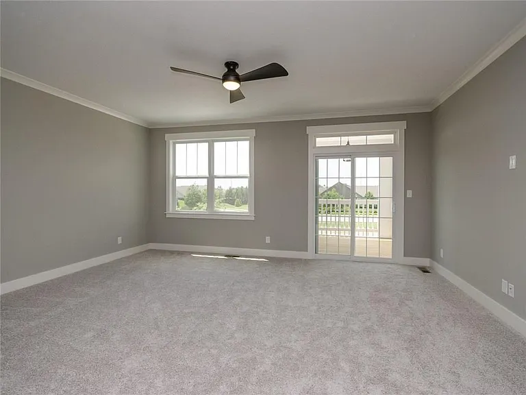 Spacious living room; flooring has been changed to LVP