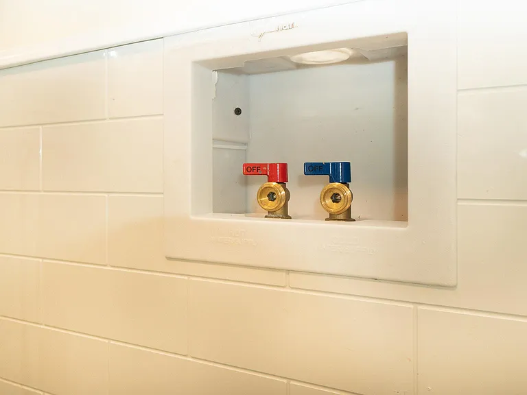 In-unit washer and dryer, provided
