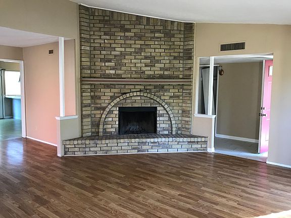 Large living room with attached den/study