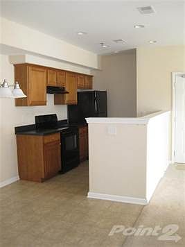Plenty of cabinets in the kitchen.