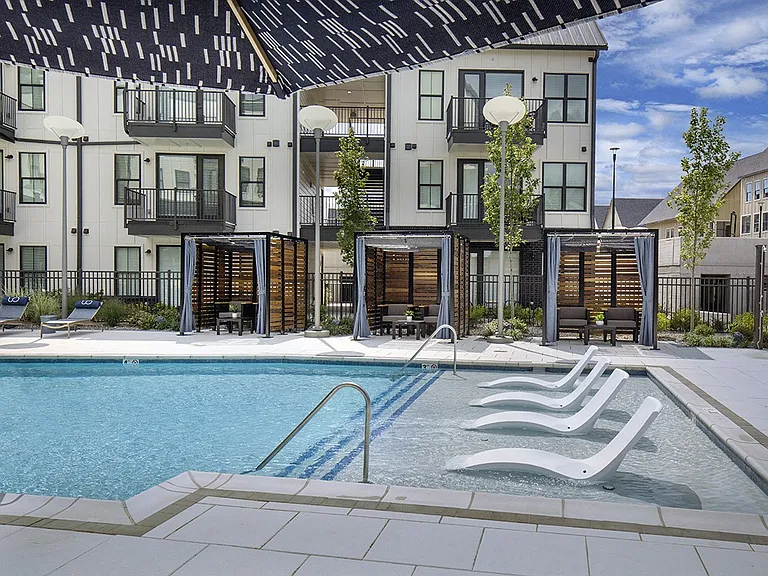 Resort-style pool with tanning ledge