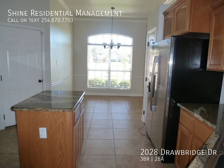 2028 Drawbridge Dr — Photo 2