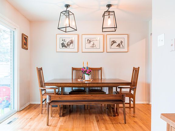 Dining Room connecting the kitchen, living room and new sliding glass door to backyard.