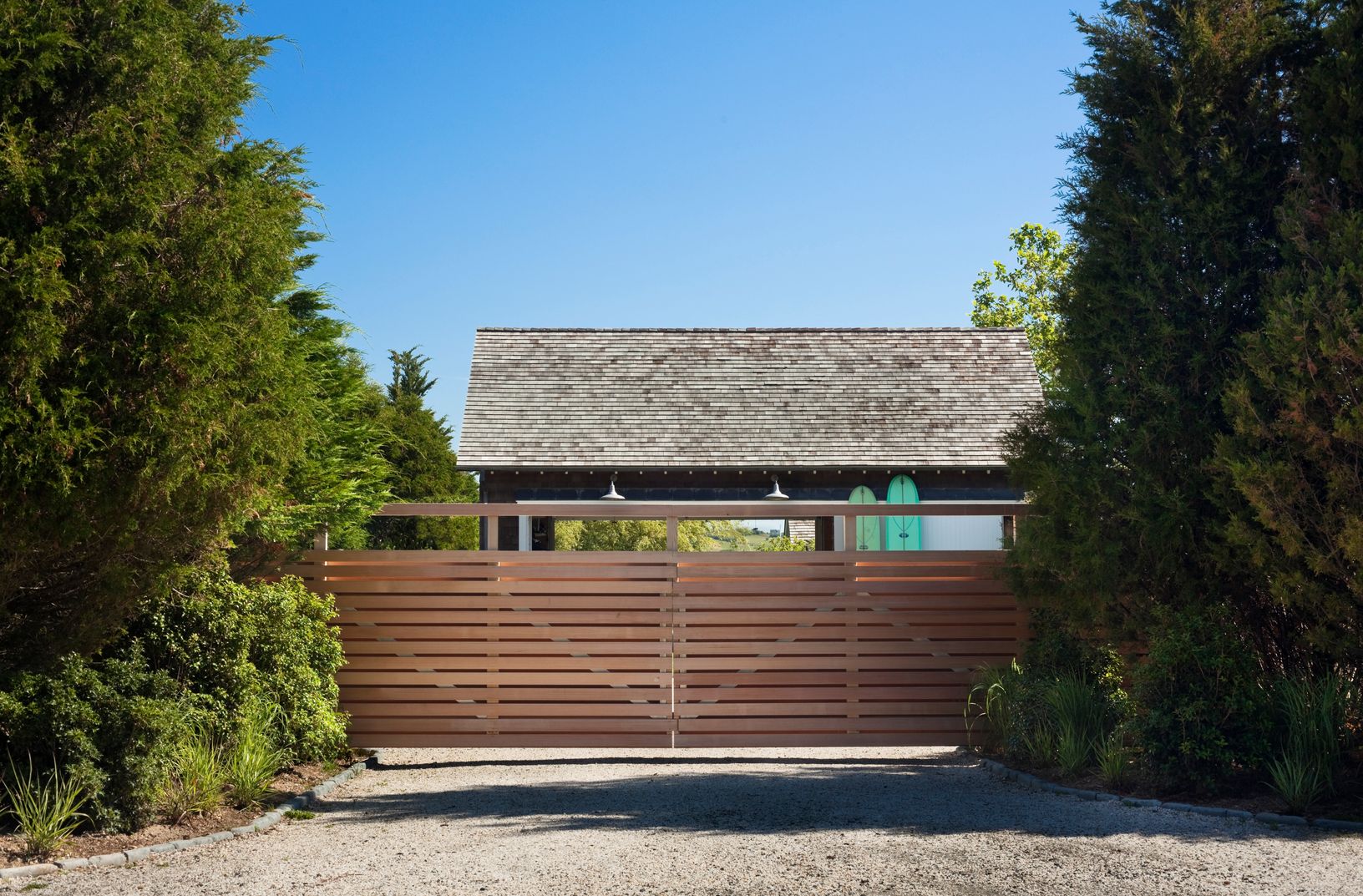  The house is completely privatized from the road with year round screening and driveway gate