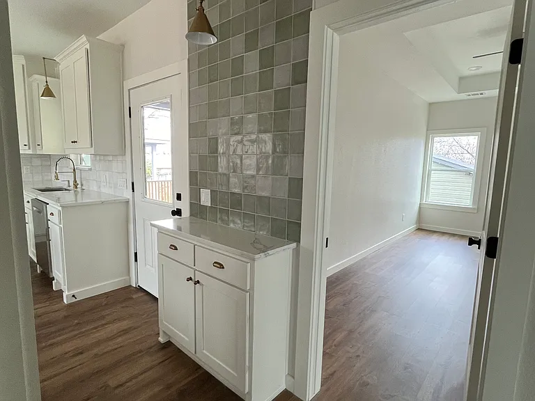 Coffee Bar is between kitchen and primary bedroom