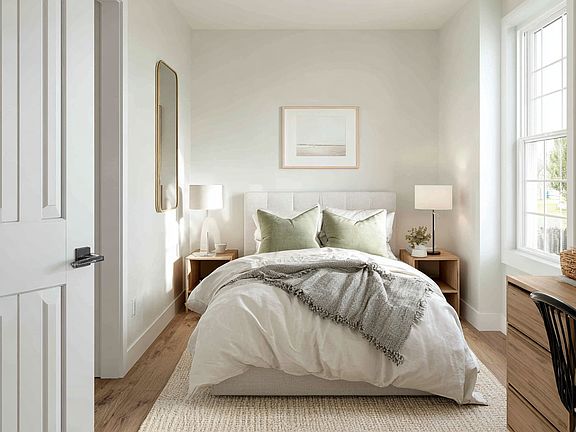 Clean and bright second bedroom with LVP flooring, large window, and a generous closet. Perfect as a guest room, home office, or nursery.