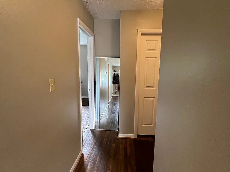 Hallway - leads to both bedrooms and the bathroom