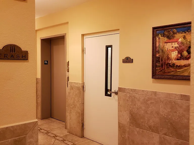 garage lobby with access to the elevator