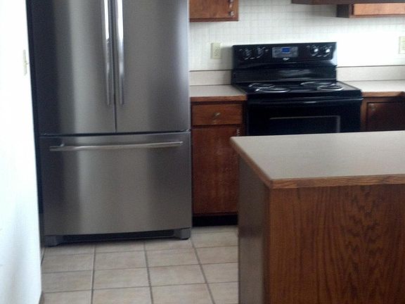 Kitchen. Includes fridge, stove, dishwasher
