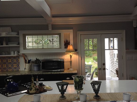 French doors open to a private deck