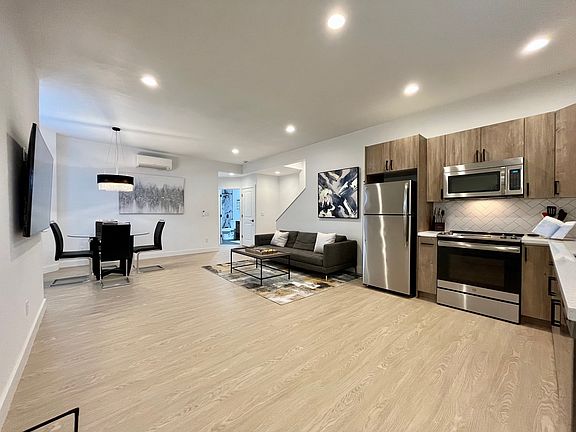 Experience the perfect blend of living, dining, and cooking in our open-concept space.