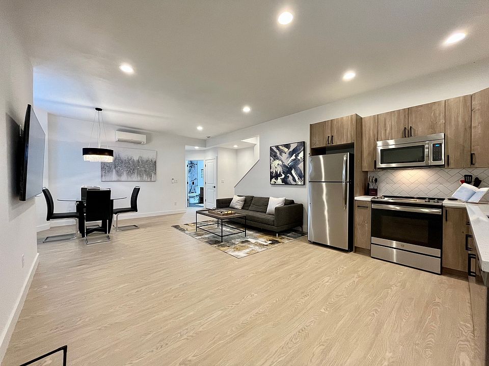 Experience the perfect blend of living, dining, and cooking in our open-concept space.