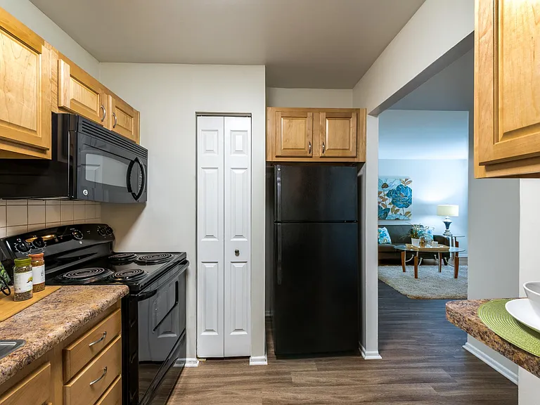 Full-equipped kitchens in either black or stainless appliance packages.